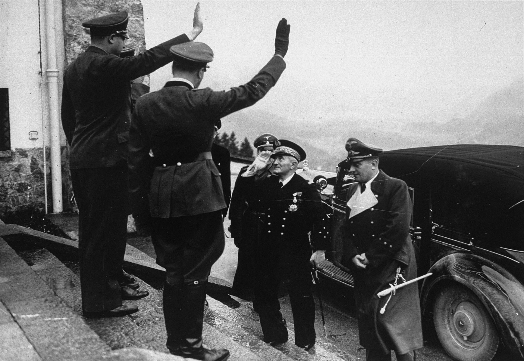 Adolf Hitler salutes Admiral Francois Darlan upon his arrival at the Berghof